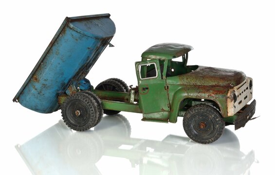 Child dump truck. Rusty car