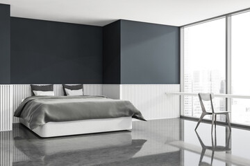 Corner view of trendy blue and grey bedroom