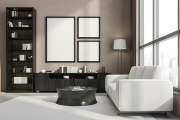 Fototapeta na wymiar Wall art in stylish beige living room with light grey couch