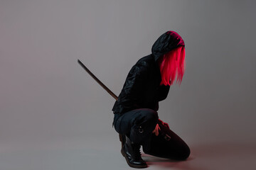 Techno cyber punk style, futuristic ninja fighter, young woman with pink hair © Ulia Koltyrina