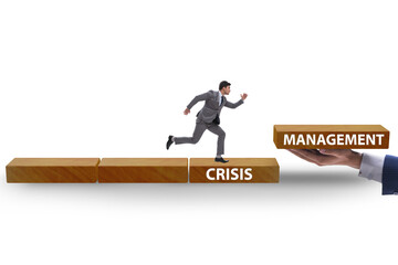 Crisis management concept with climbing businessman