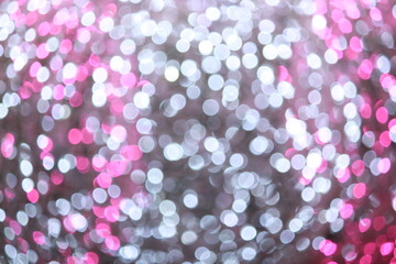 Pink and white bokeh light abstract texture background. Christmas New year and Valentine's pattern bokah, wallpaper.