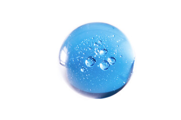 blue glass ball with bubbles against white background