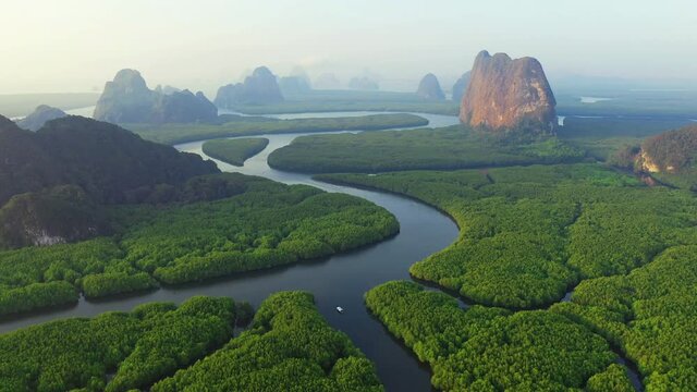 Aerial view of Phang Nga bay with mountains at sunrise in Thailand.