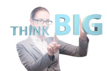 Think big concept with businesswoman