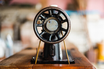 Antique vintage sewing machine Side view.