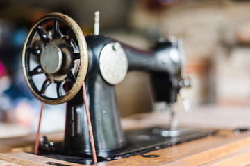 Antique vintage sewing machine Side view.