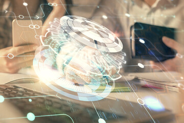 Double exposure of man and woman working together and technology theme drawing hologram. Big data concept. Computer background.