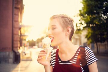 short haired woman ice cream enjoyment walk lifestyle