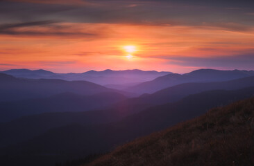 Sunrise over the carpathian mountain ridge
