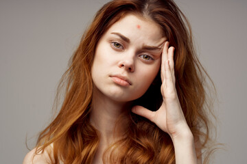 beautiful woman cosmetology skin care puberty light background