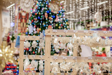 Christmas toy on the Christmas tree. New Year decoration. Decorated shop window