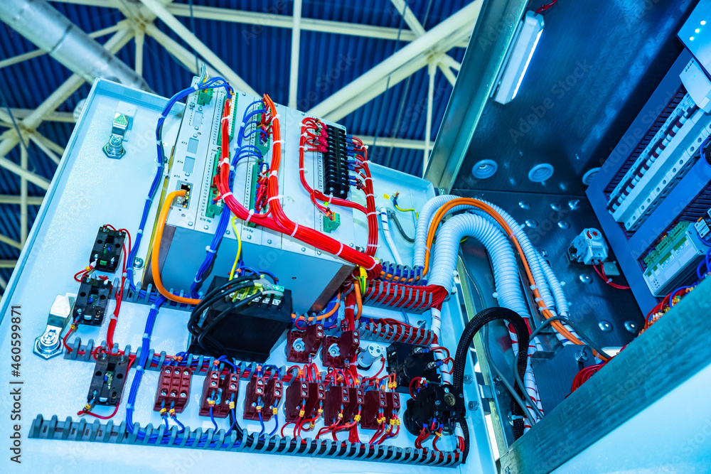 Poster electrical board with many wires and switches. automatic machine with electronics. electrical cabine