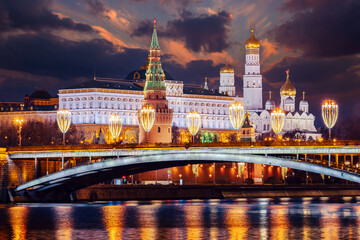 Moscow Kremlin. Russia is capital. Moscow on winter night. Grand Kremlin Palace. Christmas decorations on bridge. Kremlin towers on winter night. Sights of Moscow. Russian Federation.