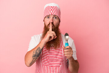 Young caucasian ginger man with long beard holding a scoop isolated on pink background keeping a secret or asking for silence.