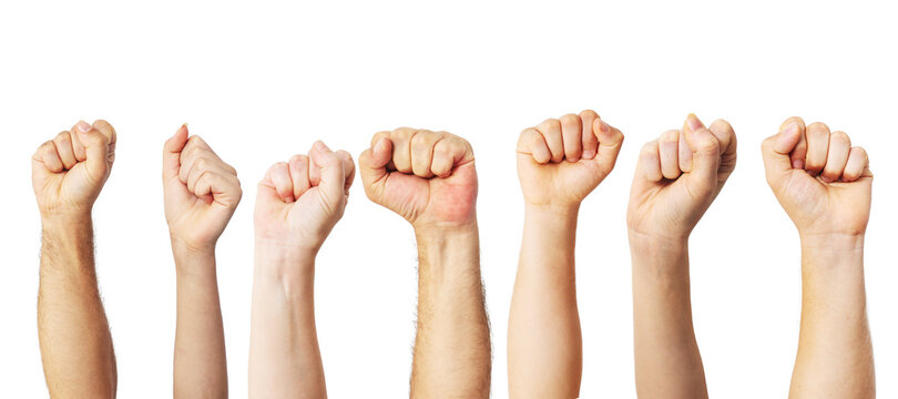 Group of people raised fists up as a victory, proud, success or strength symbol 
