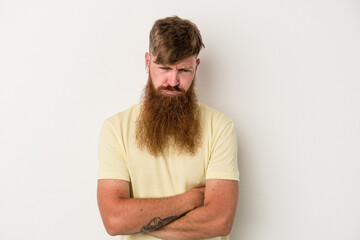 Young caucasian ginger man with long beard isolated on white background unhappy looking in camera with sarcastic expression.