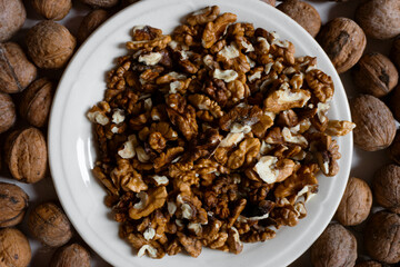 Top view closeup of a plate full of walnut kernels