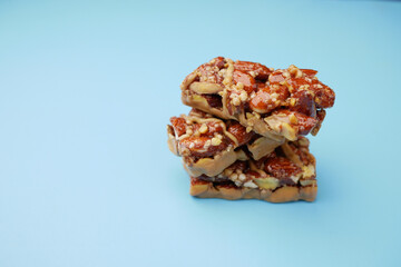 Almond and oat protein bars on table .
