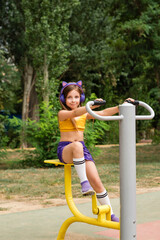 Schoolgirl preteen workout on sports ground