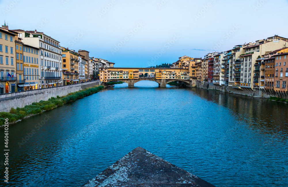 Wall mural sunset on ponte vecchio - old bridge - in florence, italy. amazing blue light before the evening.