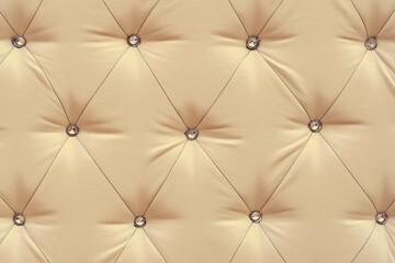 Bright upholstered sofa. Leather Sofa Texture , Leathers Upholstery Pattern. Light background...