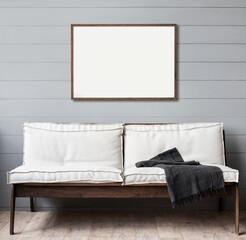 Blank picture frame mockup on gray wall. Modern living room design. View of modern scandinavian style interior. Home staging and minimalism concept