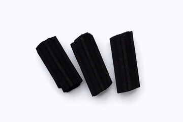 Non smoke wood charcoal on white background.