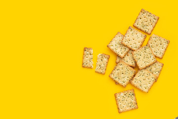 Seaweed crackers on yellow background.