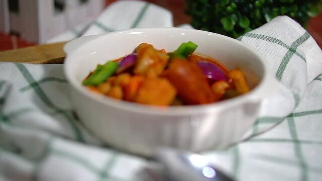 Callos is a stew common across Spain and other colonial influenced country like Philippines. It contains ox tripe, bell pepper, chick peas and onion boiled in tomato sauce