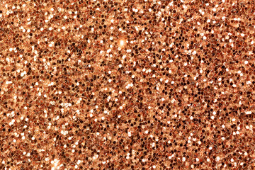 Brown shining glowing effects concept, glitter texture background, sandpapper high detailed surface photo