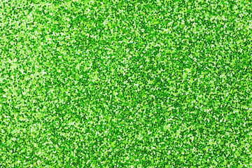 Fototapeta premium Green shining glowing effects concept, glitter texture background, sandpapper high detailed surface