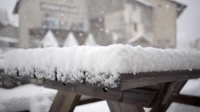 Snow on a table during snowstorm