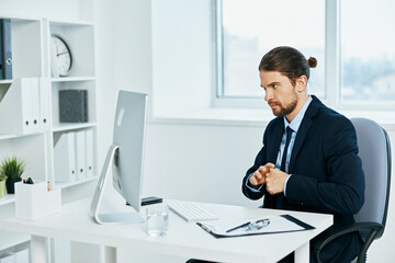 businessman work in front of a computer documents executive
