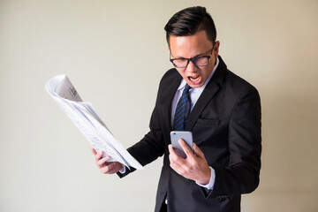 Angry businessman shout his team on phone