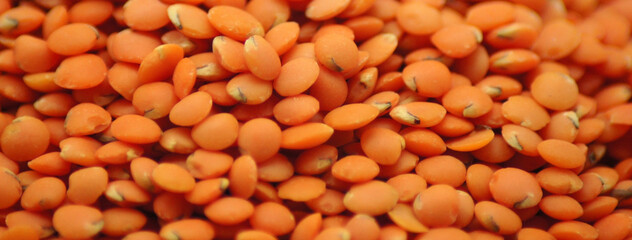 Nahaufnahme rote Linsen als Bildhintergrund