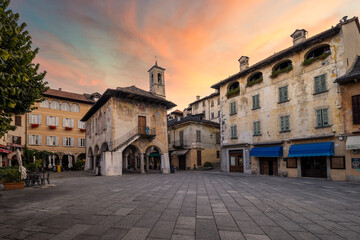 Fototapeta na wymiar Piazza Mario Motta in Orta San Giulio (Italy) in the morning during sunrise.