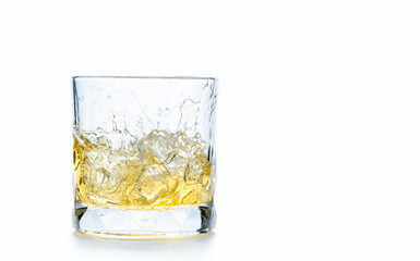 drop ice cubes in to whiskey in rock glass or Old Fashioned glass
