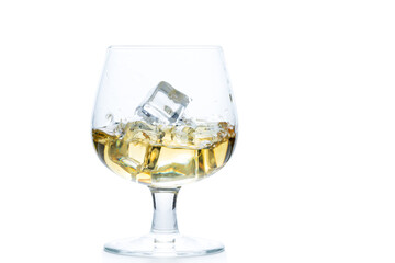 whiskey or brandy with ice in Snifter or Balloon glass isolated on white background,