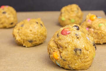 raw chocolate chip cookie dough with colorful chocolate candy
