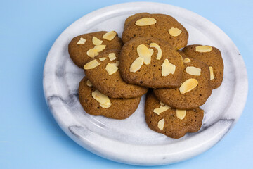 spicy cookies with sliced almonds
