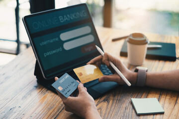 A woman comprear two credit card from other bank for decide using for online payment. online shopping concept.