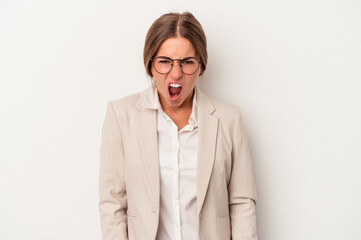 Young Russian business woman isolated on white background screaming very angry and aggressive.