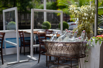 Bottles of Water at a Beautiful Outdoor Restaurant along the Street in New York City
