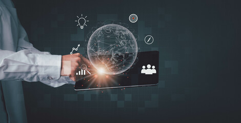 Businessman using mobile tablet on global network connection on investor and customer with sale data exchange and development of business. Financial and banking, Digital link tech, big data.