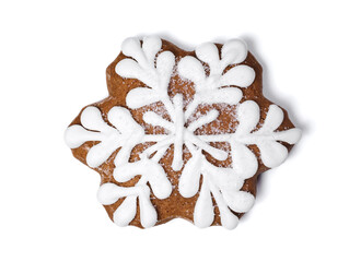 Gingerbread gifts and holidays. Snowflake from ginger biscuits on white background 