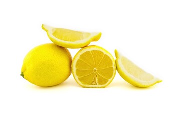 Whole and sliced ripe lemon fruit on white