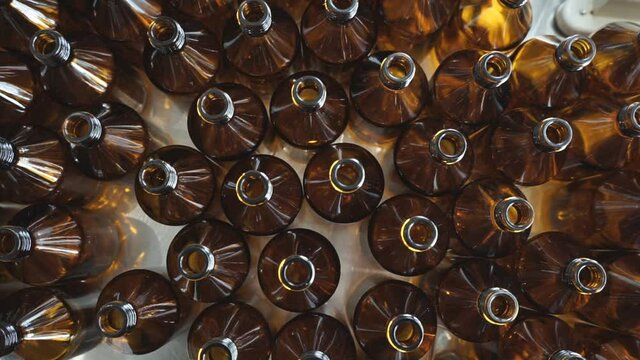 Small medicine bottles medicine container.  A close-up view of small amber bottles with white caps