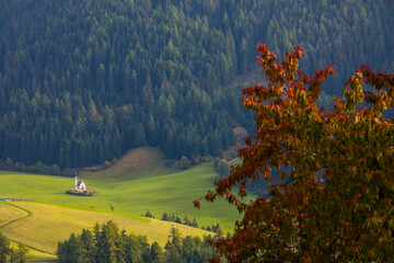Sunset and rainbow in Val Di Funes, Dolomites, Alps, Italy