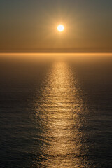 Sunset with reflection at sea.